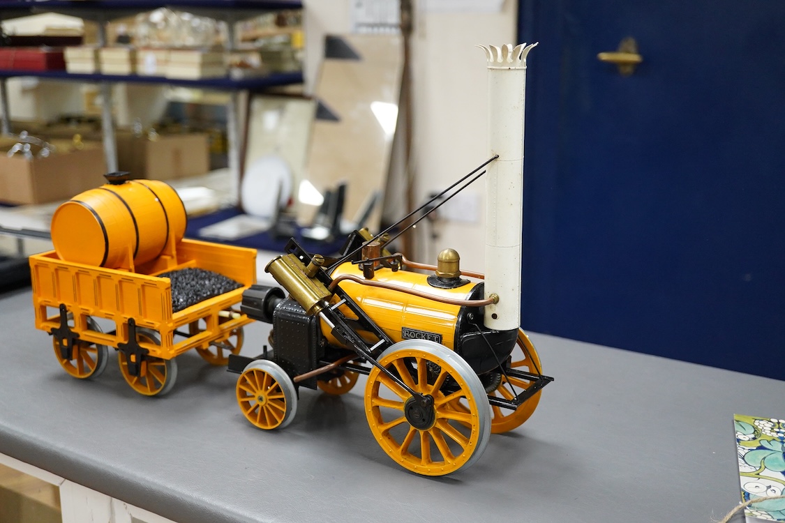 A boxed Hornby Railways 3.5 inch live steam Stephensons Rocket pack, comprising a two cylinder gas fired 0-2-2 Rocket and a quantity of plastic track sections